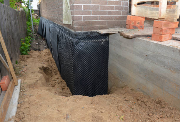 Happy homeowners after waterproofing job in Tunnelton
